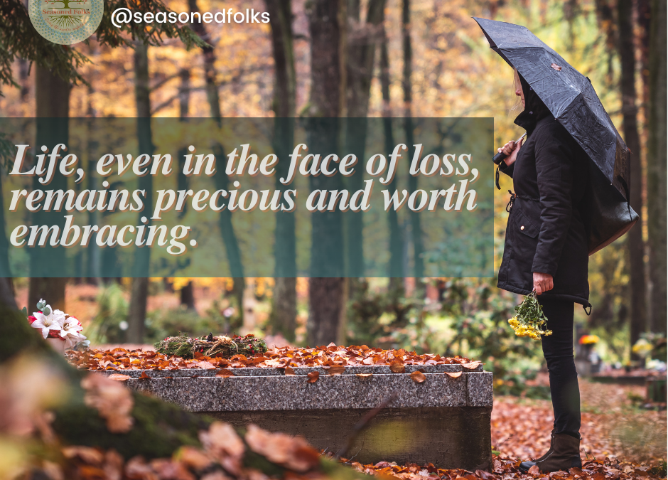 Senior Grief depecited in this image of a woman standing over a gravesite.